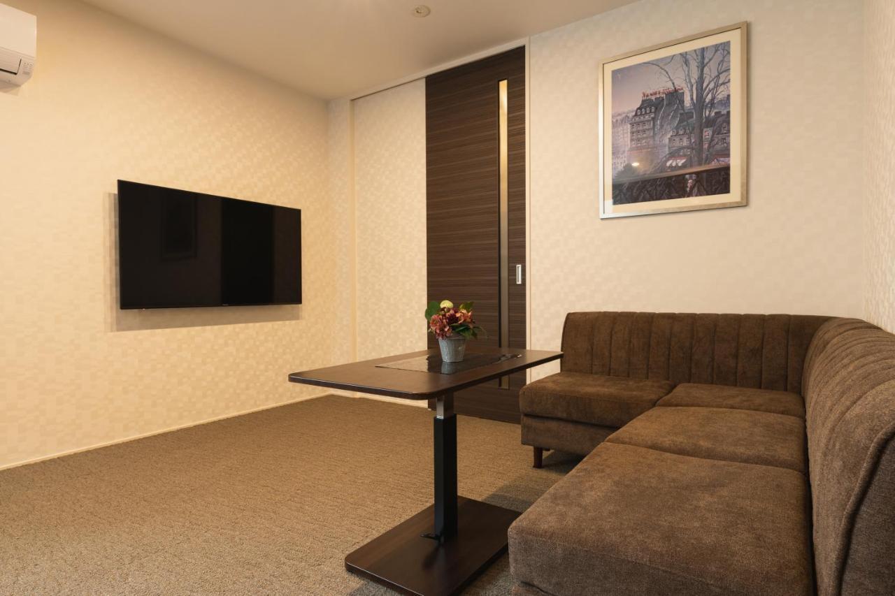 Grand Base Nagasaki Ekimae Aparthotel Buitenkant foto