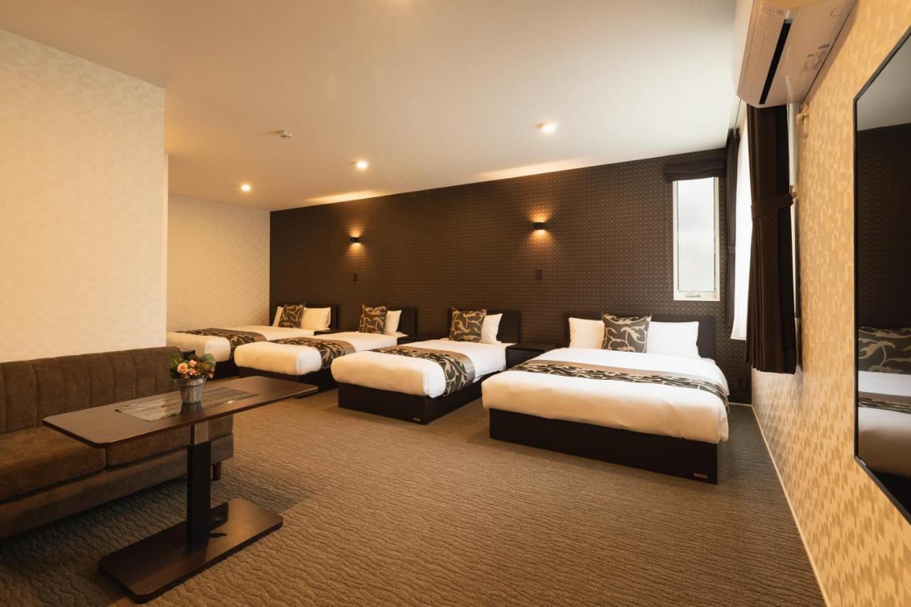 Grand Base Nagasaki Ekimae Aparthotel Buitenkant foto